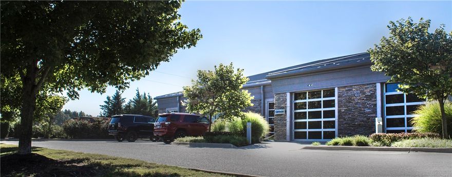 Great office building near Rainbow Curve in Bentonville near new McDonalds and Wal-Mart Neighborhood Market.  High Ceilings, stained concrete and carpeted floors with lots of natural light.  Each suite has a glass roll up door.