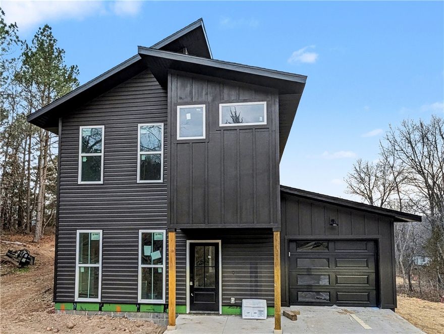 Welcome To Your Next Home At 3 Granshire Lane Where The Good Life Begins! This Sharp New Build In Bella Vista Puts You Smack In The Middle Of The Action With World-Class Mountain Bike Trails Wrapped Around You In Every Direction. Inside You Get A Bright Open Living Area With A Fireplace That Actually Makes The Room, Plus A Kitchen Built For Real Life Featuring Custom Cabinets, Bold Countertops, And An Island Big Enough To Feed The Whole Crew After A Long Day On The Trails. The Layout Just Makes Sense With A Primary Suite Upstairs Designed For Actual Rest Plus Extra Bedrooms And Baths That Keep Everyone From Getting In Each Other's Way. Top-Rated Bentonville Schools Are Part Of The Package Too. Out Back The Patio Is Ready For Morning Coffee, Cold Drinks At Sunset, Or Just Doing Absolutely Nothing And Feeling Great About It. This Is The One.