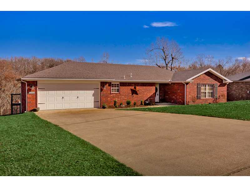 Great lake area home, built in 2005 all brick beautifully appointed! Very open living/kitchen/dining, large eating bar, beautiful tile, nice backsplash, black appliances, oil-rubbed bronze finishes on lighting, 2 huge decks, 2-big closets in master BR.,New chain link fenced area off lower deck, storage building, lot backs to a wooded area with no neighbors back there, lots of deer and wildlife. Great neighborhood, Only 2 miles to Hickory Creek public boat launch.