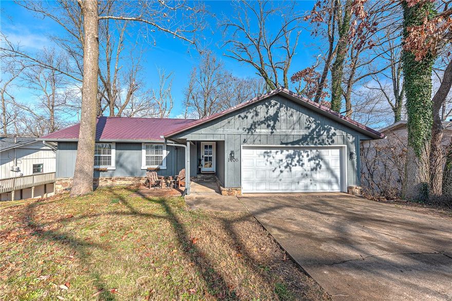 Great Location in the Heart of Bentonville. Discover this freshly renovated 5-  bedroom home nestled in a quiet neighborhood just minutes from Downtown Bentonville, Coler Mountain Bike Preserve, and Walmart’s New Home Office. This spacious property features two separate living areas and a stunning two-level back deck, creating the perfect setting for entertaining, relaxing, or hosting guests.