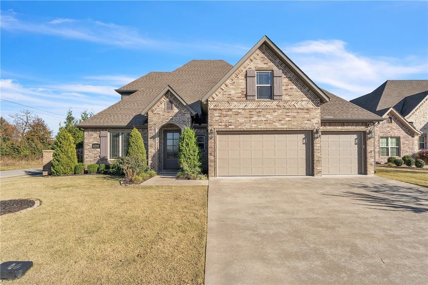 Welcome to 6201 S 49th Street — a beautiful 4-bedroom, 2.5-bath home in the desirable Cross Creek community of Rogers. Built in 2017 and offers 3,237 sq ft, this home showcases timeless design, quality finishes, and an inviting layout made for both comfort and style.

Situated on a corner lot with well-maintained landscaping, the home opens to an airy floor plan that begins with a formal dining room and flows into a gourmet kitchen featuring granite countertops, a large island with breakfast bar, built-in oven, five-burner gas cooktop, and a walk-in pantry.

The main-level primary suite provides a true retreat with French doors, dual vanities, a whirlpool tub, walk-in tile shower, and his-and-hers closets. Upstairs includes three spacious bedrooms, a full bath, and a bonus room that’s ideal for media, play, or office use.

Enjoy all the amenities Cross Creek has to offer, including a community pool, playground, and convenient access to shopping, dining, and entertainment in west Rogers.