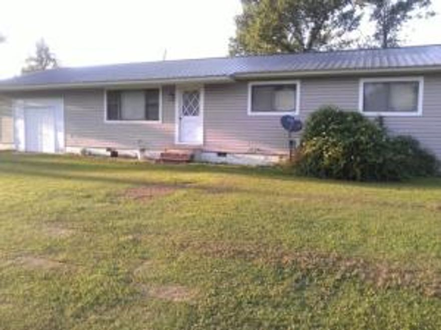 Country home on 4.8 acres, 3 bedroom 2 bath home. Fenced pasture that is fenced and cross fenced with a pond. There are some storage buildings and an older mobile home that is need of some repairs.