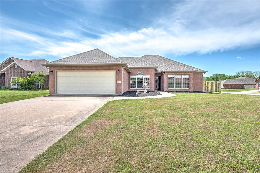 Amazing all-brick home situated on a desirable corner lot!  This home features 4 large bedrooms and 2 baths, perfect for family living. The inviting gas fireplace adds warmth and charm. Enjoy the convenience of a thoughtfully designed split floor plan along with formal and casual dining. Plus, you'll love the short walk to the clubhouse, offering a range of amenities for leisure and socializing.  This home has a new roof in 2024, along with new water heater, HVAC and garage door in 2023.  It combines comfort, style, and a fantastic location—don’t miss out on this incredible opportunity! Schedule your tour today!