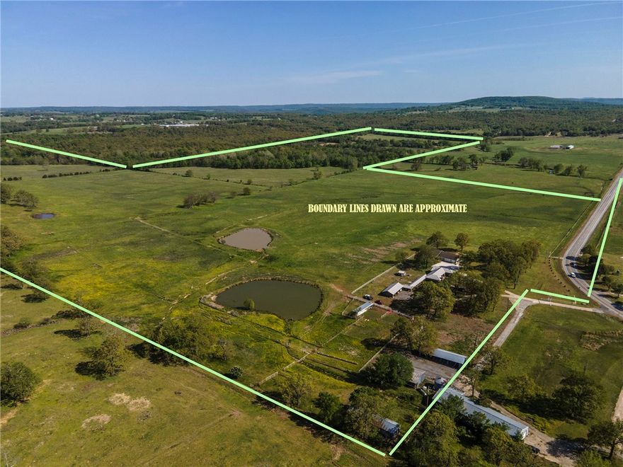 Great level land with 2257 SF, 3 BR, 2 BA farmhouse which is sold "as is". Pipe corral, two ponds & a small portion timber. House makes a great farmhand house - Currently rented. Agent owned