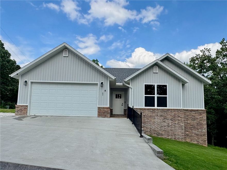 This stunning home offers 3 bedrooms, 2 bathrooms plus an additional dedicated pocket-office space, perfect for working from home or a quiet study area. Step inside to discover a large open-concept kitchen and living room, designed for both everyday comfort and entertaining guests.  The kitchen boasts custom cabinets, a spacious island (3'4"X8'3"), and a walk-in pantry for all your storage needs. Additional highlights include: Walk-in Closets in every room, Beautiful Deck, Sod Yard, Extra-long Garage with 8 foot tall door, and an additional gravel Parking Pad.