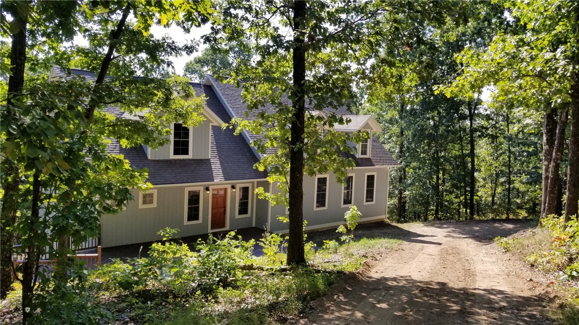 This house is one that you will have to see in order to really understand the of the possibilities it offers. The 2nd floor is waiting for you to finish it out to add 3 additional rooms as well as 2 full bathrooms. It has acreage, size and space to spread out in, possibilities to expand and customize , as well as givinga feeling of seclusion while only being minutes away from the hustle and bustle.
