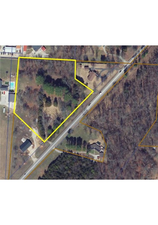 4 acres of flat land with approximately 450' of HWY 72 frontage. Over 11,000 cars per day for your high density residential or commercial project.