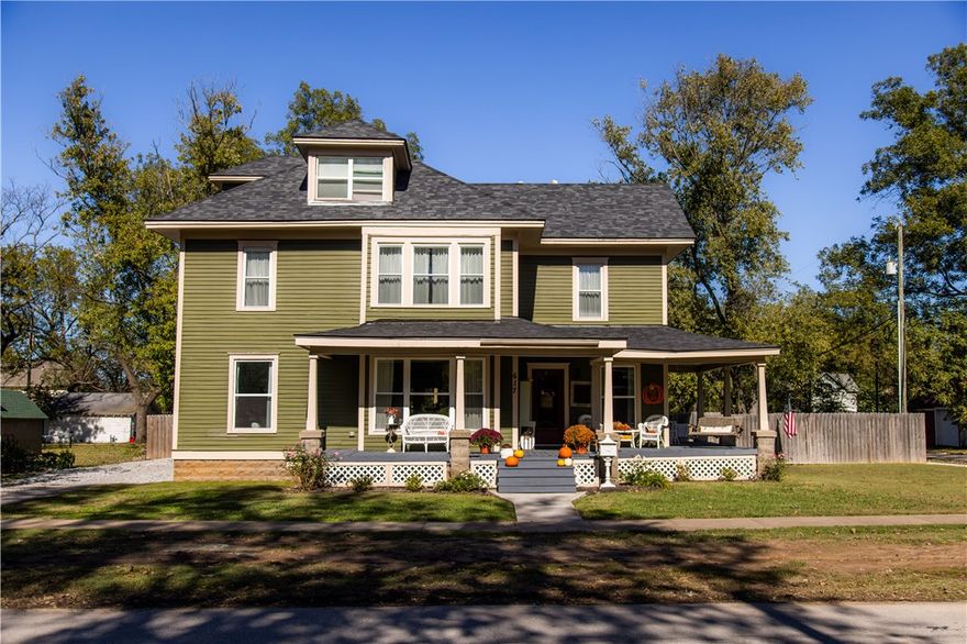 A hard-to-find Downtown Siloam Springs jewel, this beautifully restored historic home has been meticulously renovated down to the studs. No detail was overlooked—all-new plumbing, HVAC, flooring, fixtures, and appliances. Step inside to discover a thoughtfully designed main level, complete with a formal dining room, a spacious living area, an elegant eat-in kitchen, a walk-in pantry, and a stylish half bath. A beautifully crafted staircase leads to the second floor, with three bedrooms. The primary suite is a retreat, boasting a spa-like en-suite bath with a luxurious soaking tub, a walk-in tiled shower, and a conveniently integrated laundry area within the walk-in closet. On the third level, a versatile bonus room could serve as a fourth bedroom, a playroom, or private home office. Outside, the charm continues with a covered back porch overlooking the oversized lot. Don't miss your chance to own this historic beauty.