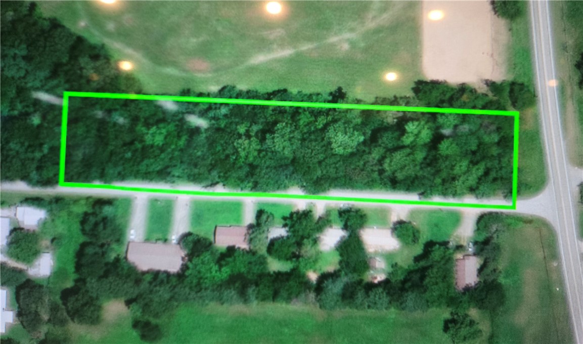 "Excellent opportunity to build your dream home! This corner lot, located at the intersection of Highway 7 South and Gip Annie Road, offers the freedom of no restrictions and the convenience of town utilities readily available at the road. Enjoy the peace of rural living while being just a short distance from all the amenities of town."