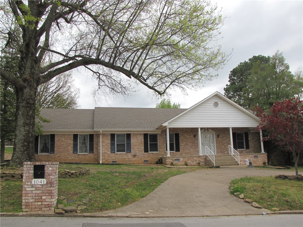 If you have been waiting to live in the area of Mount Sequoyah, wait no longer! Be in the heart of Fayetteville! 2 miles to Gulley Park. This home has only had two previous owners! This is a one level home with two living rooms, 3 bedrooms, 2 bathrooms and a heated and cooled sunroom. You will be sure to have coffee on your covered front porch or cocktails in the four seasons sunroom. This home has been meticulously cared for and it is ready for a new owner to put their own touches in it. With large rooms and an abundance of natural light the possibilities are endless. HVAC only a couple years old, roof 6-7 years. Home to be sold as is,