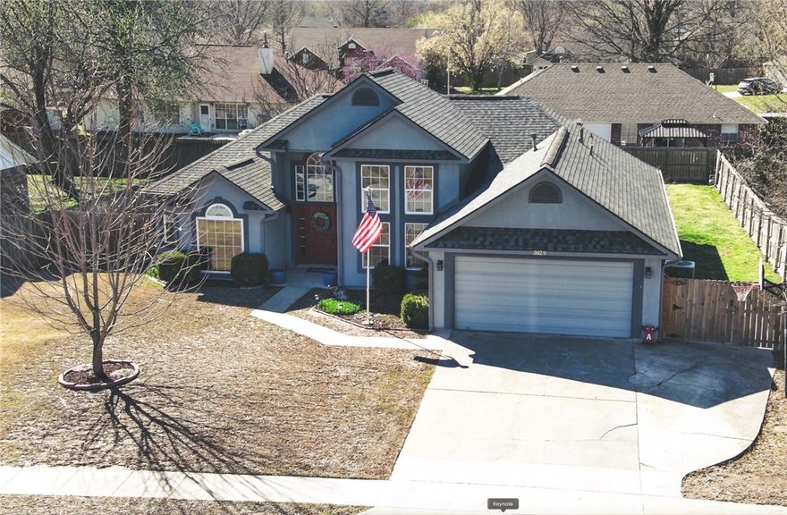 Welcome to this beautifully maintained and updated home in desirable west Fayetteville, perfectly positioned for comfort and convenience. Just a short walk to Holcomb Elementary and the scenic trail system, this home offers peaceful living with easy access to outdoor recreation, schools, and everyday amenities. Inside, a grand vaulted entryway creates an inviting first impression with wonderful light and spaciousness. The split floor plan provides added privacy, separating the primary suite from the secondary bedrooms—ideal for families or hosting guests. The primary suite includes a cozy reading nook perfect for unwinding, enjoying morning coffee, or relaxing in your own quiet retreat. Outside, the fully fenced backyard offers a generous deck overlooking a spacious yard, ready for gatherings, summer barbecues, or simple evenings under the stars. This home has been thoughtfully cared for and updated, combining modern comfort with timeless appeal. See the attached list of updates and schedule your showing today!
