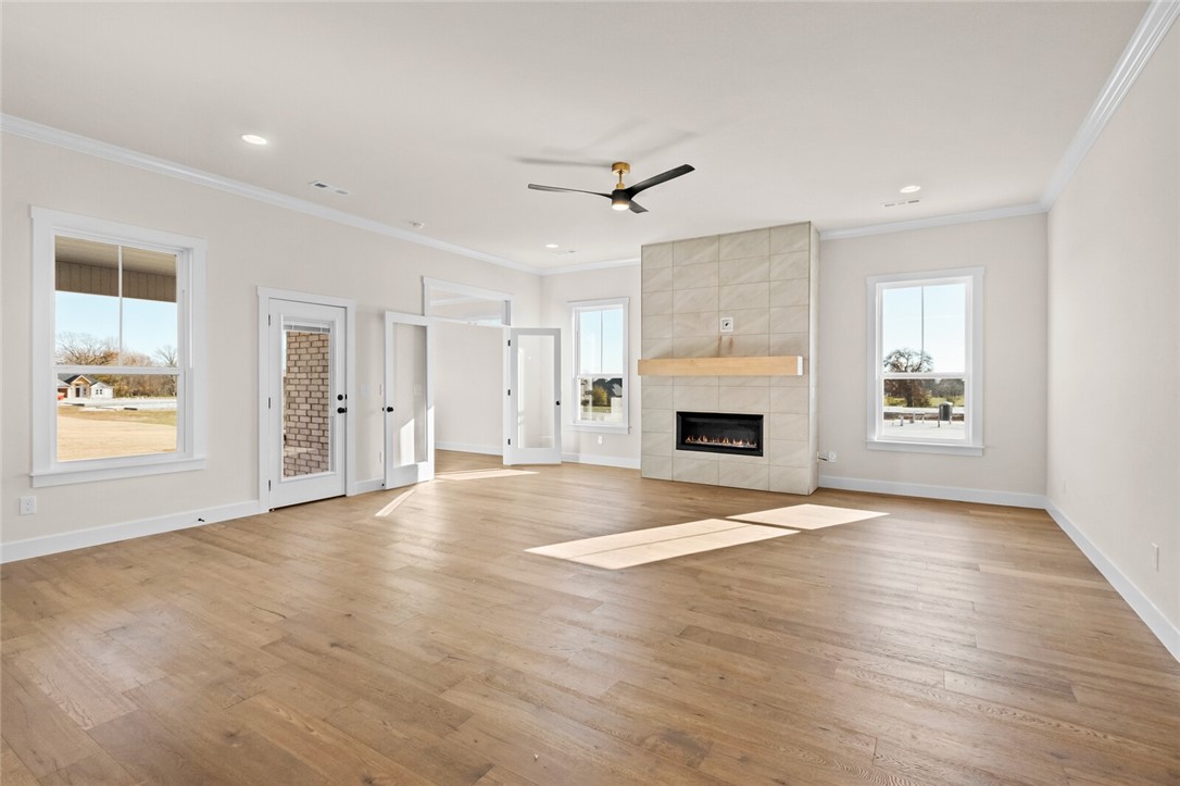 This stunning new construction has everything you could possibly want in a home. Offering 4 spacious bedrooms and 3.5 bathrooms, the Dreamwood Plan is designed for both comfort and style. The kitchen is a true highlight, featuring custom cabinetry, a large pantry, and double ovensāperfect for family meals or entertaining. The primary suite includes a spacious sitting room and a luxurious en suite with a free-standing tub and a beautifully tiled shower. A thoughtfully designed guest room could easily serve as a second primary bedroom, providing added flexibility for family or guests. Outdoor living is elevated with a large covered patio and fireplace, making it ideal for gatherings in every season. The house is still under construction and pictures are not of actual house but similar plan and finish. Taxes are based on land only. Seller is offering $7500 towards closing costs and preferred lender incentives available.