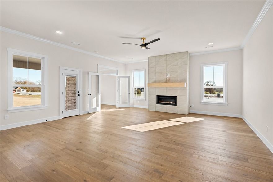 This stunning new construction has everything you could possibly want in a home. Offering 4 spacious bedrooms and 3.5 bathrooms, the Dreamwood Plan is designed for both comfort and style. The kitchen is a true highlight, featuring custom cabinetry, a large pantry, and double ovens—perfect for family meals or entertaining. The primary suite includes a spacious sitting room and a luxurious en suite with a free-standing tub and a beautifully tiled shower. A thoughtfully designed guest room could easily serve as a second primary bedroom, providing added flexibility for family or guests. Outdoor living is elevated with a large covered patio and fireplace, making it ideal for gatherings in every season. The house is still under construction and pictures are not of actual house but similar plan and finish. Taxes are based on land only. Seller is offering $7500 towards closing costs and preferred lender incentives available.