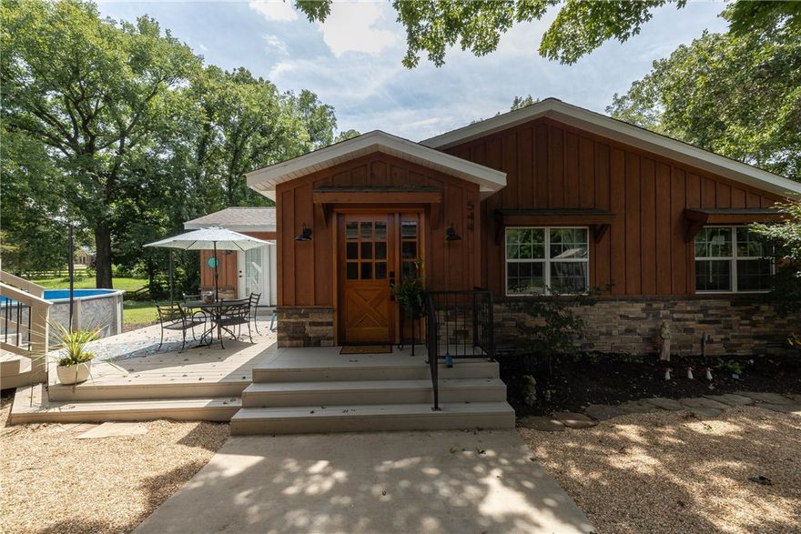 Discover luxury country living just 25 minutes from downtown Fayetteville! This remodeled/expanded 3-bedroom, 2-bath home was updated in 2021 with a new roof, HVAC, flooring, and custom kitchen cabinets. The exterior shines with new cedar siding and stonework for a warm, inviting feel. Set on 5 acres—part wooded, part pasture- this property is ideal for relaxation or recreation. A pole horse barn with partial cement floor, two stalls, and a closed-in tack room is ready for your equestrian or hobby farm needs. You’ll also find a detached 2-car garage with covered porch, plus an uncovered deck leading to an above-ground pool, creating the ultimate outdoor oasis. A rare find combining modern upgrades, peaceful acreage, and convenience to town—this property has it all!