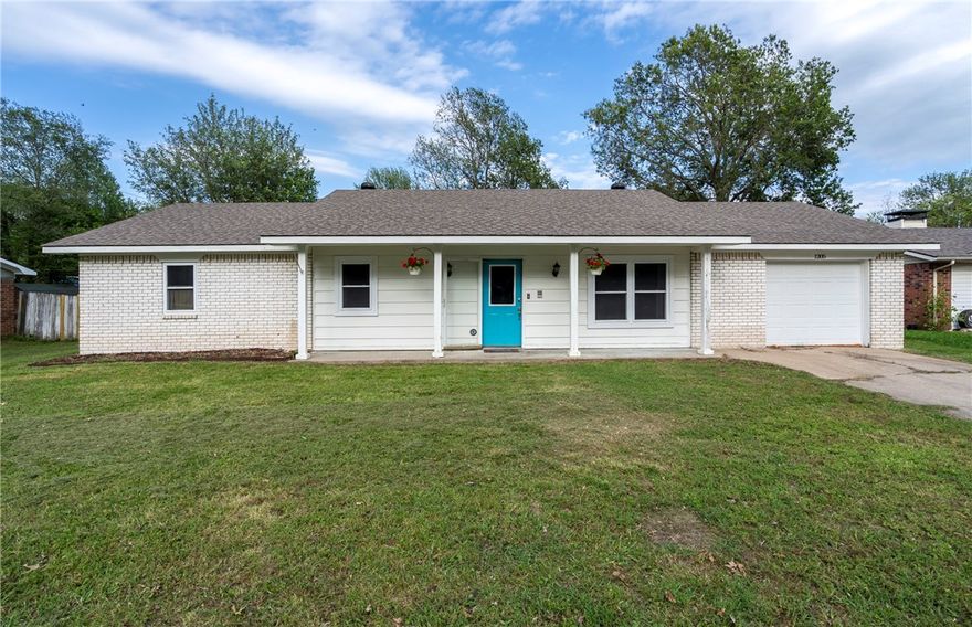 3 Bed 1 1/2 Bath cute home with a one car garage, covered front porch, chain link fenced large backyard, updated windows, wood laminate floors throughout, newer appliances and open floor plan! New dishwasher just put in this month. Refrigerator conveys with the property. Owner is in the process of moving out. Inside pictures are coming soon. This would make a great starter home or investment property. This won't last long!