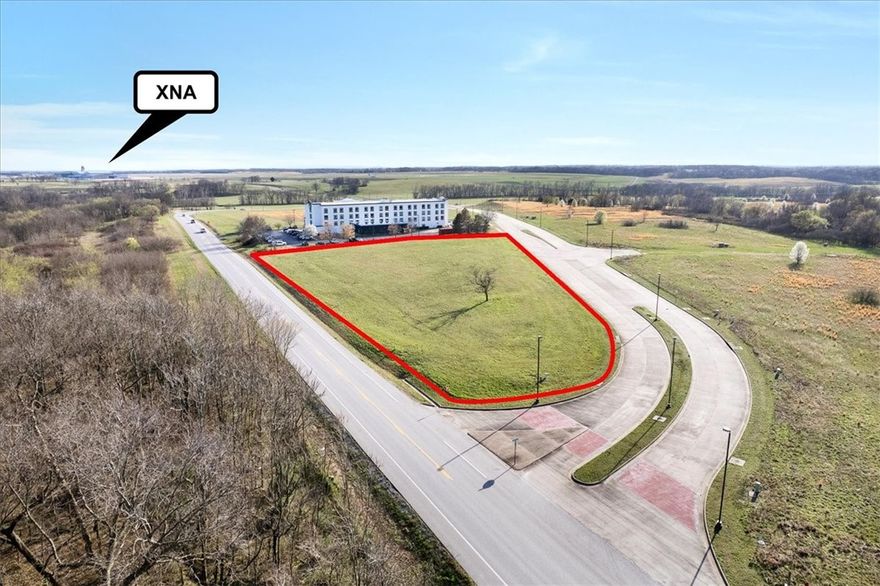 Prime 2.72-acre opportunity in Benton County! Parcel #01-10278-000 is vacant, unimproved land in the path of rapid Northwest Arkansas growth. Gas, electric, and water are available at the site, offering a strong head start for development. Located minutes from the XNA airport terminal and next to a major hotel, with excellent visibility, a high-traffic corridor. Traffic counts range from 9,000 to over 30,000 vehicles per day (VPD) depending on the specific section. Ideal for short-term rentals, extended-stay or corporate housing, small multifamily, office, or service-based commercial uses catering to traveler demand. Easy access to Bentonville, Centerton, Rogers, Springdale, and Fayetteville enhances its appeal. Strategic location, strong exposure, and growing demand near XNA make this a compelling investment. Buyer to verify zoning and permitted uses. Drive by today!