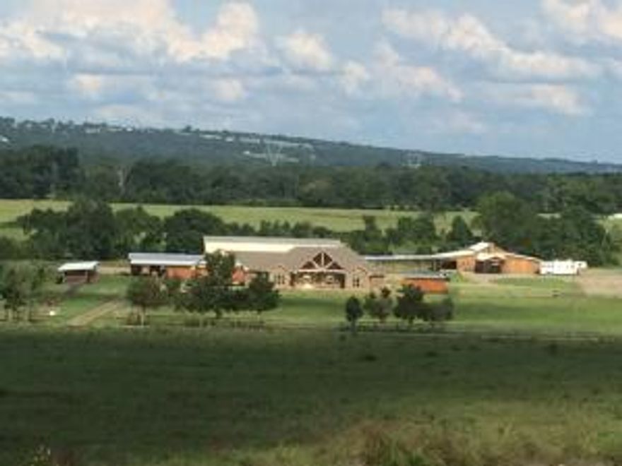 INCOME POTENTIAL combined with luxurious living. 31+ acres that speaks the equestrian language having a horse coral and arena. Put a little extra in your pocket by renting out your event center for weddings, parties, etc. with living room, kitchen and bedrooms. 3500sqft home with a chef's kitchen, floor to ceiling rock fireplace with wood storage, and indoor sauna. Guests welcome here in your guest home with all the amenities!