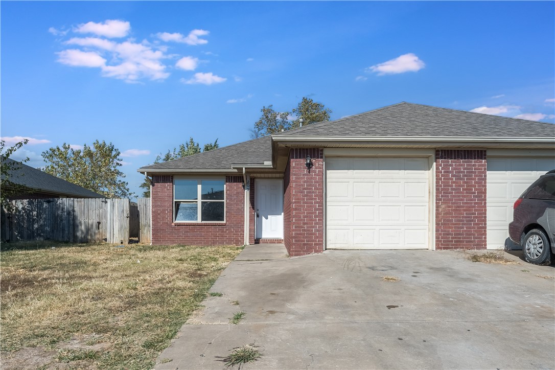 Nice 3 bedroom 2 bath duplex close to schools and 71 business. Plenty of room with open living room and kitchen, one car garage and a good size back yard. Refrigerator included. Pictures are similar but may not be exact. New LVP flooring. Credit and Background check required