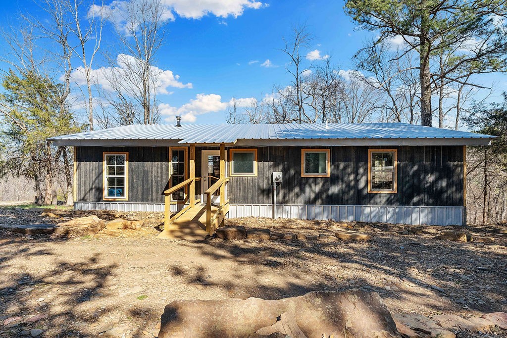 Welcome to this newly built 800 Square foot modern luxurious cabin, where rustic charm meets contemporary elegance. Surrounded by breathtaking mountain views, this cozy home is flooded with natural light, creating a warm and inviting atmosphere. It features an antique clawfoot soaker tub, Septic system pre-approved for extra space or an RV, an efficient wood-burning stove, and custom woodwork crafted by talented local artisans.
This comfortable cabin offers a truly unique and homely living experience!