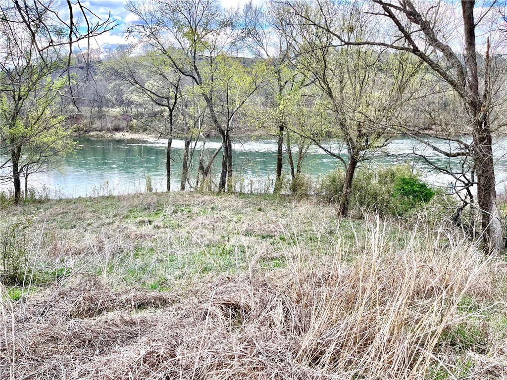 Fantastic White River frontage! Motivated seller priced at $20k-$75k lower than other White River frontage lots in the area! Catch Rainbow and Brown trout right from your backyard! Build your dream home or deluxe fishing cabin in secluded luxury! This beautiful upscale neighborhood is set in a peaceful valley next to the Ozark National Forest and has underground electric and very basic protective covenants. The lot has 123.7 feet m/l of river frontage. Fish & Game ramp in subdivision. Level building site with a beautiful sloping bank. It's time to get your White River dream started!
The seller is a licensed real estate broker in Texas.