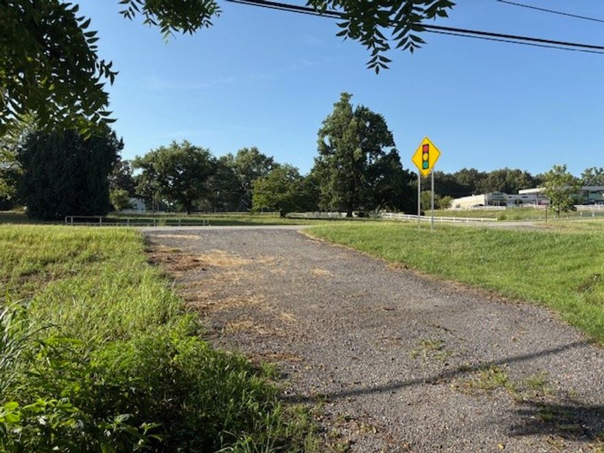 5.56 Acres on Busy Hwy 65  in Marshall, AR. What a great location for your business, near Harps Food Store, Casey's General Store and McDonalds. Also, it's just a few miles south of the beautiful Buffalo River and National Park. 
This property also has a 1344 sq ft home on it.