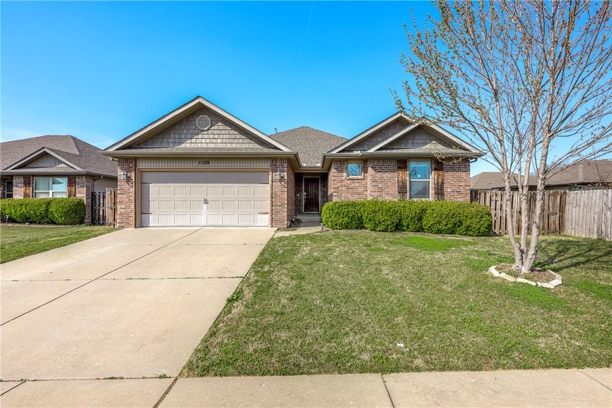 Well maintained 4 bedroom, 2 bath brick home in Rogers offering 1,676 sq ft, a functional floorplan, and thoughtful updates designed for comfortable everyday living. The kitchen features granite countertops, center island, pantry, gas range, pot filler, built-ins, and opens to the living room with real hardwood floors, crown molding, and a cozy gas fireplace. The generous primary suite includes a jetted tub for added comfort. Enjoy the covered back patio and large fenced backyard, ideal for relaxing, pets, or entertaining. Additional highlights include built in garage shelving, new roof in 2025, and new HVAC in 2026. Located near schools and minutes from Blossom Way Trailhead & Razorback Greenway trail, approximately 2 miles to Interstate 49 with quick access to shopping, dining, Pinnacle Hills Promenade, and major Northwest Arkansas employers.