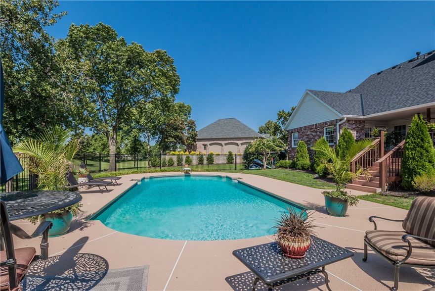 Rare Pinnacle offering situated on one of the best golf front lots on the course. Overlooking the #11 green & #12 tee box while canopied by mature trees providing back yard privacy for the heated gunite pool. The fantastic open floor plan boasts 3 bedrooms on the main level, 2 family rooms, a spacious gourmet kitchen & wall-to-wall windows framing the gorgeous views. Master suite features his & her bathrooms with a shared shower. Upstairs accommodates 4th bedroom suite with full bath. New roof just put on August 2020!