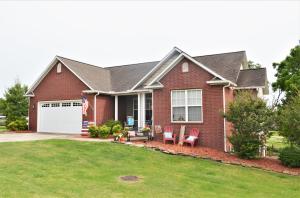 You're going to want to see this stunning all brick 4 bedroom 3 bath home. It's located It's located right in the middle of Harrison Schools. Only a block away from Skyline Heights. Then a short drive to middle school, Junior High and High School. It has a very inviting main level where you will find the Master Bedroom as well as bedrooms 2 and 3. Down stairs there is another bedroom and a great family area.