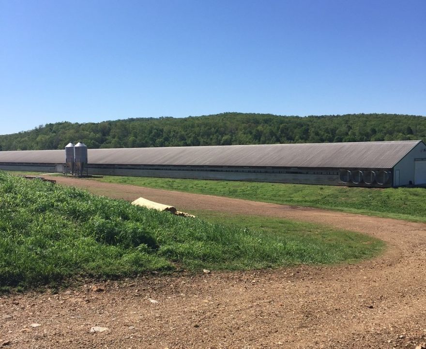 Good income producing turkey farm on 30.27 acres. Cargill contract, 3 steel truss turkey houses, litter/compost shed, pump/generator shed and metal barn. Natural gas supplies turkey houses and a good spring provides water for the 2 stage tom turkey operation. There is also a rural water tap that serves as a back-up emergency source. Pasture for cows or horses with ponds. Two dwellings located on the property. 3 bedrooms, 2 baths, approx. 1,600 sq. ft. main home and an additional 960 sq. ft. apartment.