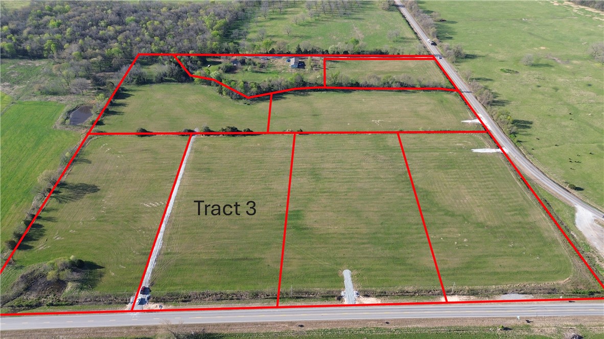 Tract 3 is located is located off of hwy 102 in western Benton County. Upon finalization of the survey/plat, Tract 3 will be 5 m/l acres. Located off of paved road with electric and rural water at the street, this tract provides an excellent oppotunity to live in the country but have convenient access to Gravette, Decatur, Siloam Springs and the rest of NWA.