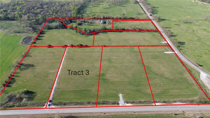 Tract 3 is 4.85 acres and is located off of hwy 102 in western Benton County.  Located off of paved road with electric and rural water at the street, this tract provides an excellent oppotunity to live in the country but have convenient access to Gravette, Decatur, Siloam Springs and the rest of NWA.