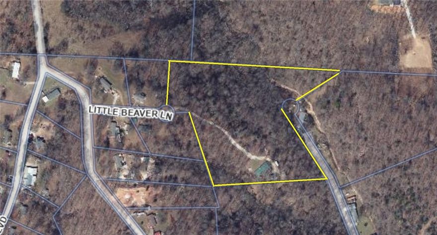 Wow, this has everything you want in your private retreat. Well cared for with upgrades, like the fabulous chef kitchen. Listed as 3 bedroom but really has 5 bedrooms. Plenty of space for a storage room, bonus room, hobby room, or an office or 2. Internet is on Star Link. This place is built to be a peaceful! place to call home. Large deck on back with access to the storm shelter. Green house conveys for the green thumb in the family. With 3 outbuildings for a shop, toy parking, storage. Near Beaver lake. Fruit trees. Dog house.