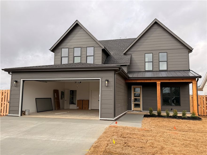 Welcome to Meadow Brook in SW Rogers! Great community in the best location! This plan features 3-4 bedrooms (2 flex spaces either bedroom 2 or study option as well as upstairs bedroom 4 or bonus room). All bedrooms have walk-in closets with plenty of storage! Downstairs you will find the primary bedroom. Great layout with open kitchen/living room area. Kitchen has large island to sit up to 6 bar stools, built-in gas cook top, built-in oven and microwave, large pantry, and eat in dining area. Primary bedroom feature en suite bathroom with soaking tub, walk-in shower, his and hers separate vanities, and large closet with lots of built-ins. Bedrooms 2, 3 & 4/bonus room are upstairs along with a full bathroom. Enjoy the evenings grilling on the covered back patio! Can't beat location being only minutes to shopping, dining, groceries stores, and only steps to the Razorback Greenway Trail.