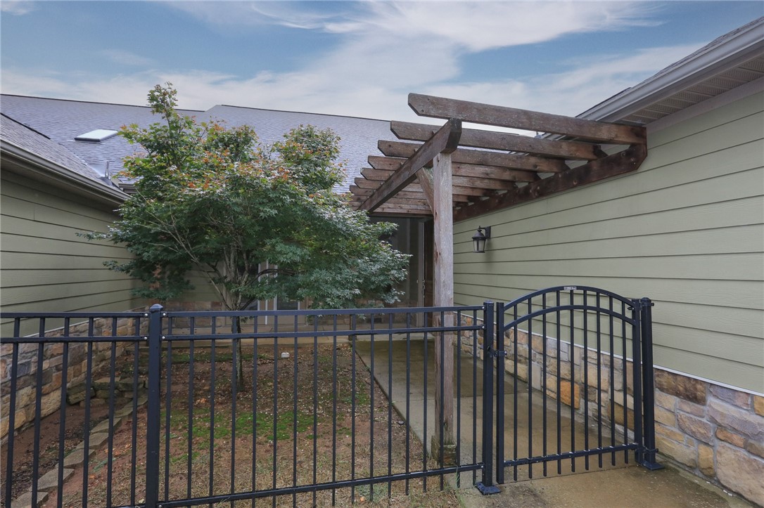 Located just minutes from downtown, shopping, the water park, local eateries, schools, and scenic trails, this stunning newer townhome offers the perfect blend of convenience and comfort.
Step inside through your private iron-gated entrance with pergola and enjoy nearly 2,000 sq. ft. of open-concept living space designed with no wasted space. The main living area is filled with natural light, highlighted by vaulted ceilings and two skylights for an airy, inviting feel.
The kitchen features stainless steel appliances, granite countertops, a spacious island bar, and pantry—ideal for both daily living and entertaining. The primary suite is a retreat with a spa-like ensuite bath, including a large custom decorative shower and soaking tub.
Throughout the home, you’ll find wood flooring and tile in all main living areas, blending style with easy maintenance. Best of all, lawn care and yard maintenance are included, so you can simply relax and enjoy your space.