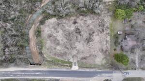 1.26 acre+/- level parcel on S Church St, Atkins, AR, accessible by driveway. Utilities at the street.