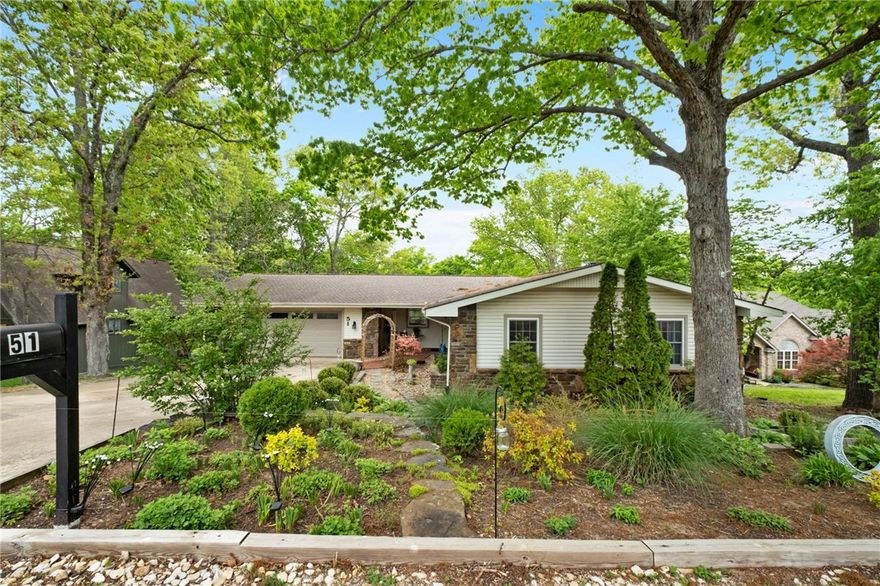 Experience refined lakefront living on Lake Windsor. This 3 bed, 3 bath retreat blends a treehouse-inspired design with a light, coastal aesthetic and sweeping water views. The main level offers an open, airy layout with wood beam accents, expansive bay windows, and seamless access to a lakeside deck. The kitchen features granite countertops, custom-painted cabinetry, and a functional pantry. A walk-out lower level provides a private guest suite, additional living space, and generous storage. Set on 0.57 acres with terraced landscaping, a covered patio, and a concrete path leading to a private dock with an electric lift. Over $60K in thoughtful upgrades since 2020, including HVAC, flooring, lighting, and drainage improvements. A rare opportunity for elevated waterfront living.