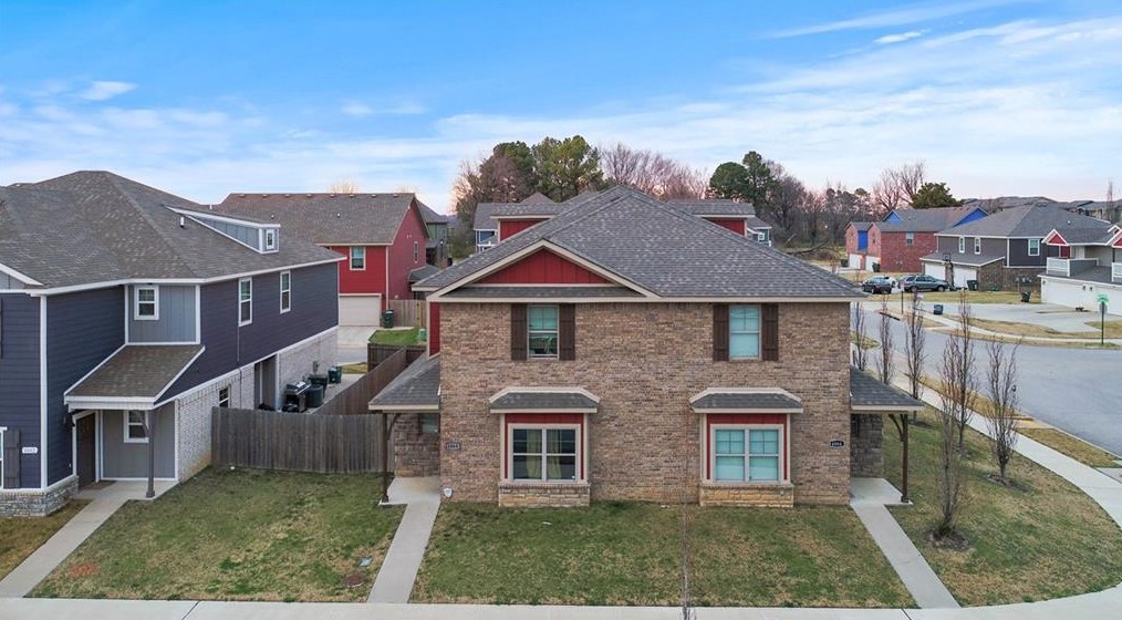 Great investment opportunity near the University of Arkansas. Built in 2018, the duplex has 4 bedrooms with 4 en-suite bathrooms and one half bath. It has a large living room space, granite counters, a 2 car garage, and a patio.