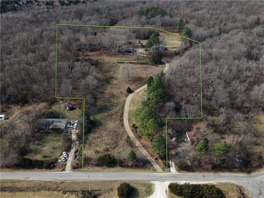 Discover Your Dream Property!**
This expansive 11 acres m/l in West Fork, Arkansas, presents an incredible opportunity for both personal use and development. The property features a residence (as is), a spacious barn, a garage, and ample storage facilities, making it ideal for a variety of uses.

With its prime location bordering I49, this land offers significant development potential, ensuring excellent visibility and accessibility for future projects, whether residential or commercial. 

Enjoy the tranquility of nature with two serene ponds and open pastures, perfect for livestock, recreation, or simply enjoying the outdoors. The property also includes beautiful timber areas that enhance its natural beauty.

Located at 15451 Winn Creek Road, this versatile land is perfect for those seeking a family estate, hobby farm, or investment opportunity. Don’t miss out on the chance to own a piece of Arkansas paradise with endless possibilities!