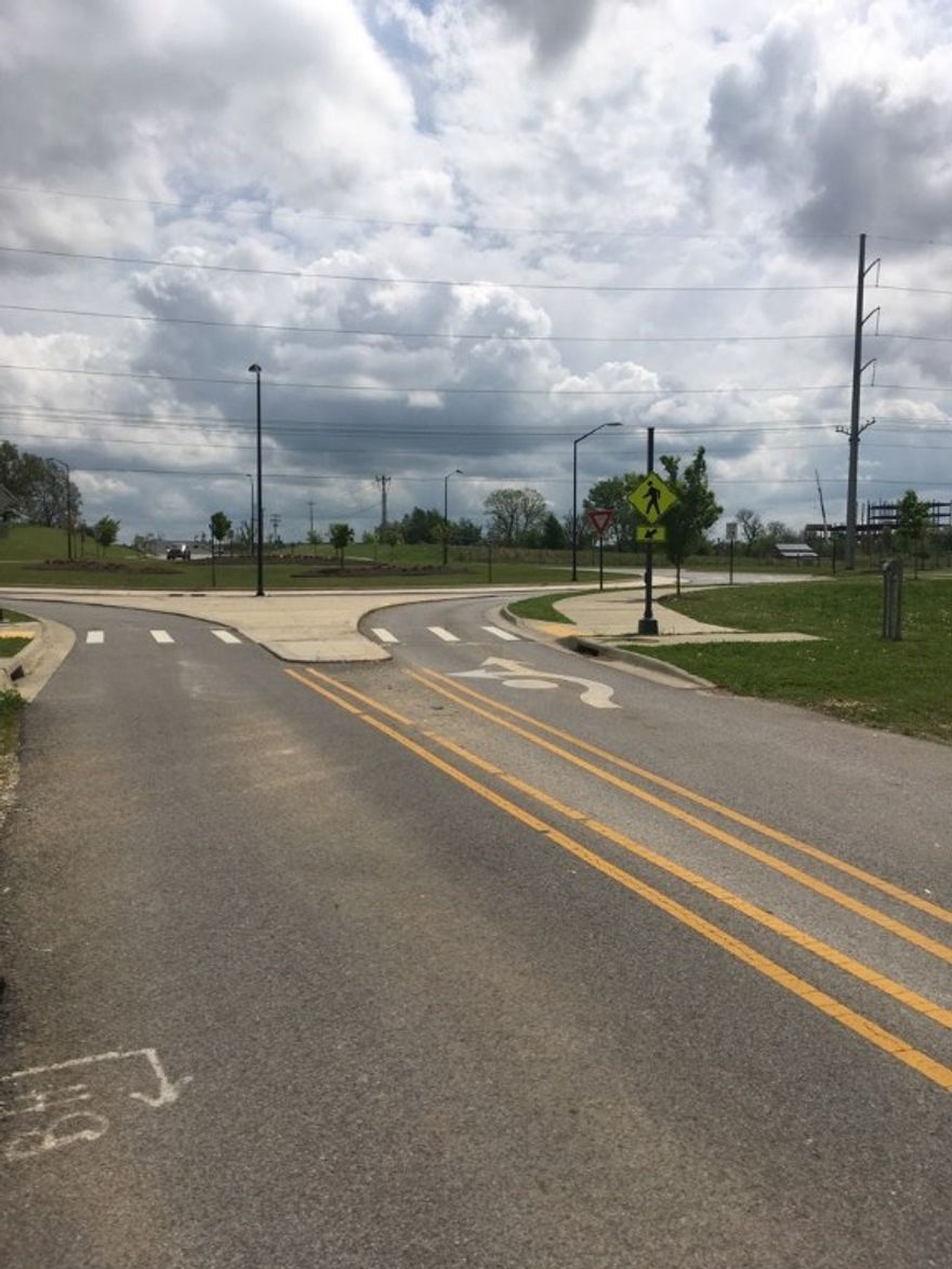 In the round-about at the corner of don tyson parkway and s. 56th st. in springdale, this property is 1.43 acres with high visibility. Zoned c-2 and has 457 feet of road frontage. Close to arvest ballpark, arkansas childrens hospital and highlands oncology, just off interstate 49. Lots of possibilities for many types of businesses. This tract is 2 parcels; parcel # 815-30887-000 and parcel # 815-30888-000. This intersection is soon to be extended to hwy. 112 in tontitown.