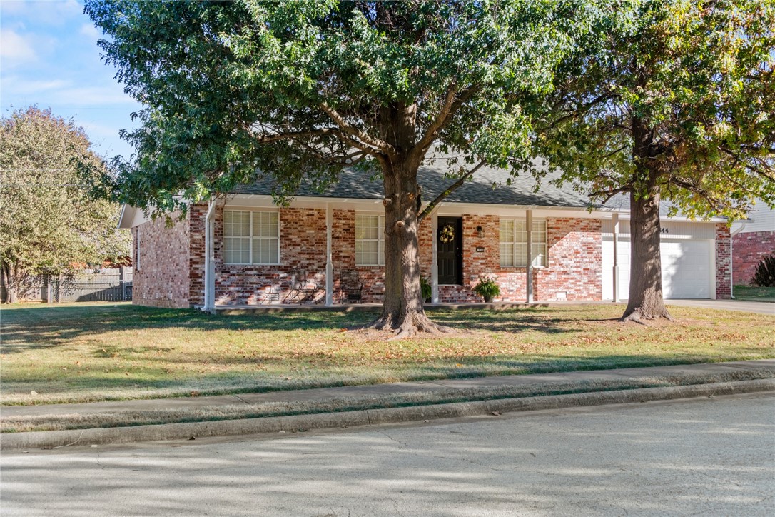 Come check out this adorable, newly updated house, located in a quiet, peaceful neighborhood, close to shopping, schools, parks, etc. A full list of all the updates is attached, including a new roof. A few of the special features of the house are; an open floor plan, nice screened in back porch, extra garage/workshop with a roll up door and parking pad for an RV with electric and sewer hookups, fireplace with gas starter, and a separate irrigation line for the yard. Located on a corner lot with large, beautiful trees and sidewalks throughout the neighborhood.