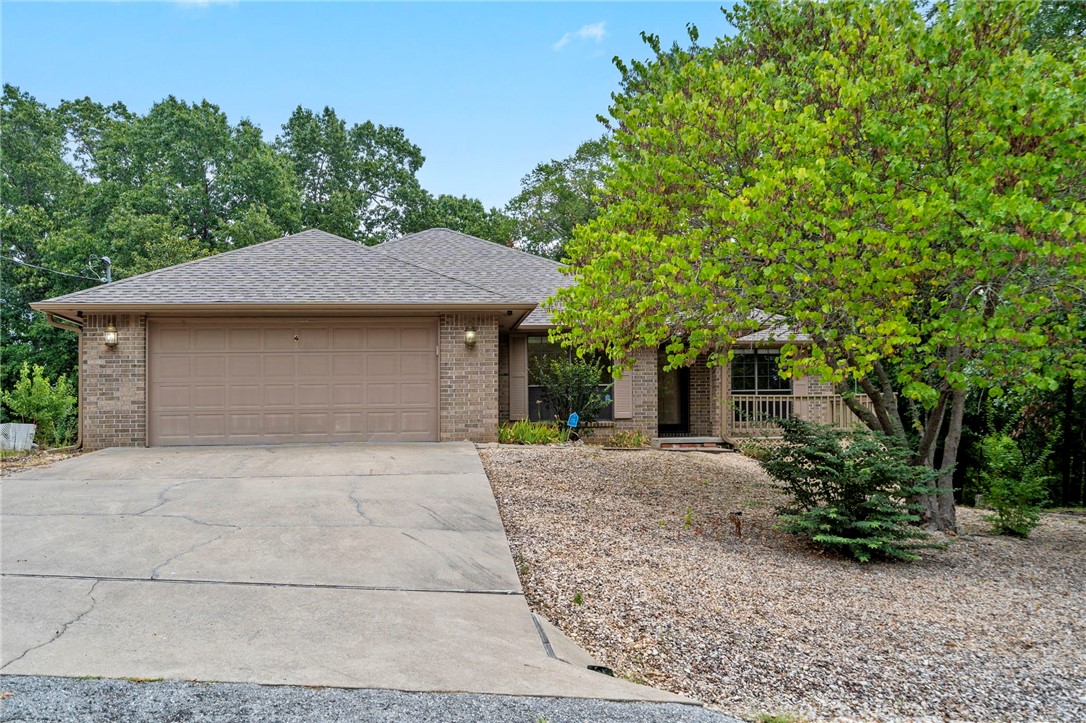 Welcome to this well-maintained, one-owner home nestled on a quiet street in a highly desirable Bella Vista location. Inside, you’ll find a spacious living room with fireplace, a second living area for entertaining, and a bright sunroom that overlooks the large lot. The primary suite features direct access to its own large deck—perfect for morning coffee or evening relaxation. An extra storage shed adds convenience for tools, bikes, or outdoor gear. Enjoy easy access to Blowing Springs, the Back 40 Trail, Lake Bella Vista Park, and all the dining and entertainment of downtown Bentonville. A rare combination of space, charm, and location!