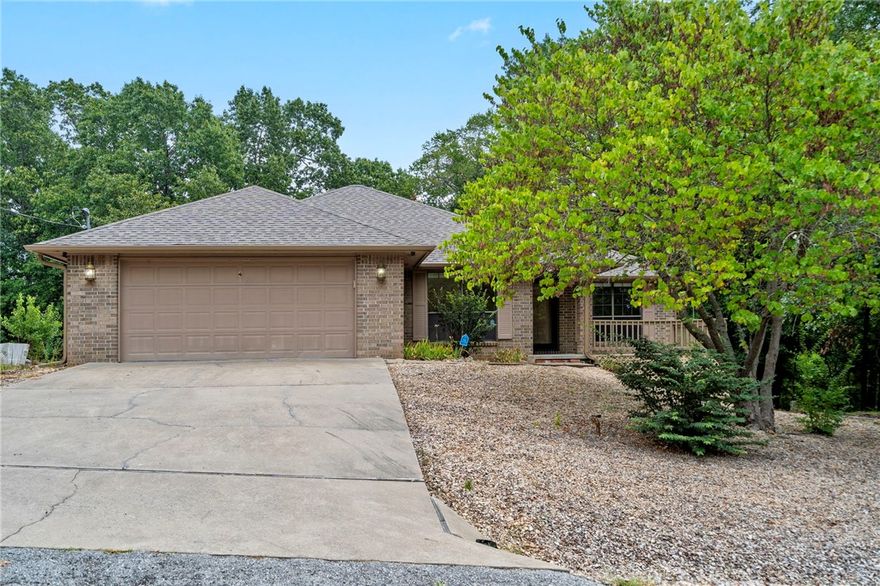 Welcome to this well-maintained, one-owner home nestled on a quiet street in a highly desirable Bella Vista location. Inside, you’ll find a spacious living room with fireplace, a second living area for entertaining, and a bright sunroom that overlooks the large lot. The primary suite features direct access to its own large deck—perfect for morning coffee or evening relaxation. An extra storage shed adds convenience for tools, bikes, or outdoor gear. Enjoy easy access to Blowing Springs, the Back 40 Trail, Lake Bella Vista Park, and all the dining and entertainment of downtown Bentonville. A rare combination of space, charm, and location!