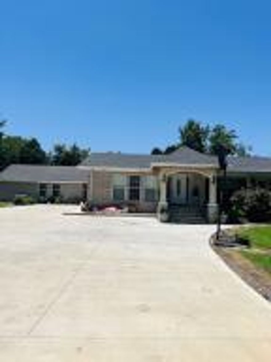 Looking for a country home with almost 2,000 sq ft  just a 6 minutes from Dardanelle ?  This beautiful brick    home sits on 2.5 acre lot with no restrictions. Features one of the kind entrance,  spacious , open floor plan living room, kitchen offers white  ceramic tiles countertops , large laundry area with two closets, a covered porch with a handmade grill oven, and unfinished mother law quarter.