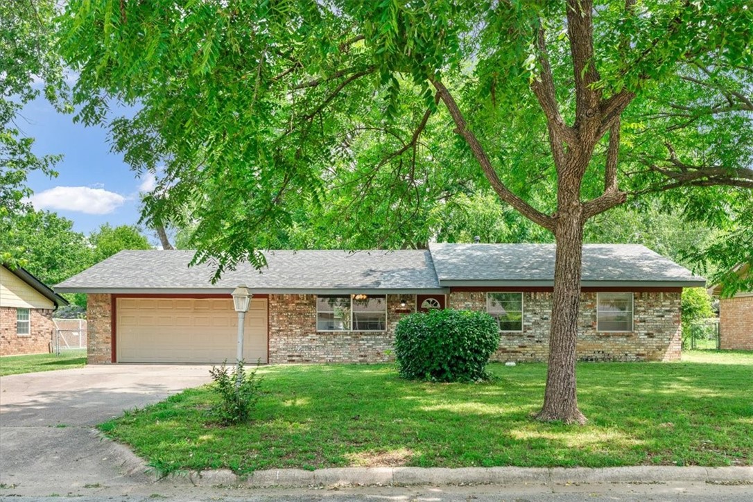 Centrally located just 3 minutes from the I-49 Elm Springs exit and 5 minutes to Downtown Springdale, this well-maintained ranch-style home offers both comfort and convenience. With updated flooring and a newer roof, it’s a smart move for first-time buyers, investors, or those looking to downsize without compromise. The spacious yard, framed by mature trees, is perfect for relaxing, entertaining, or letting pets roam. A solid, low-maintenance home in a prime location with lasting value.