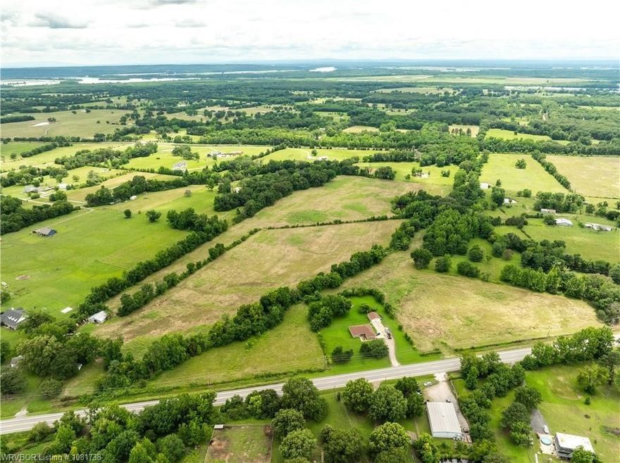 2.4 Acres Just Outside Alma City Limits – Endless Potential! Discover the possibilities with this incredible 2.4-acre tract located just outside the city limits of Alma, Arkansas—yet still within an Alma address! Whether you’re looking to develop, farm, invest, or build your dream home, this versatile piece of land offers unmatched potential. With rolling acreage, wide-open views, and easy access to utilities nearby, this property is a rare find. Its proximity to town makes it an ideal location for residential development, agricultural use, or recreational space. Enjoy the peace of rural living with the convenience of being just minutes from shopping, schools, and I-40 access. Don’t miss your chance to own a large piece of land in the growing Alma area—this one won’t last long!