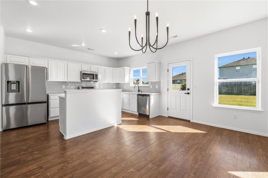 Back on market due to no fault of seller or home. Just remodeled and move-in ready! This spacious 2,644 sq ft, 4-bedroom, 2.5-bath Bentonville home features fresh paint, new fixtures, new carpet throughout, and updated kitchen and bathroom countertops with brand-new appliances. A large bonus room offers extra space for work, play, or relaxation. The home feels bright, clean, and modern throughout, and is conveniently located just minutes from Walmart Headquarters, downtown Bentonville, schools, parks, and trails.