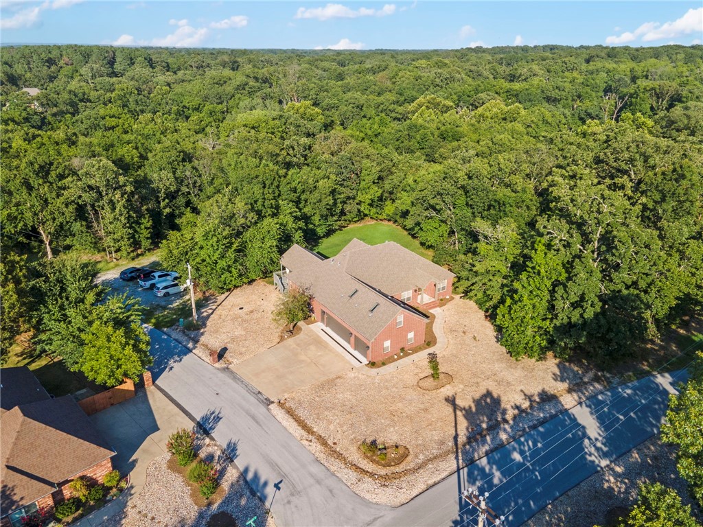 Welcome to this beautifully maintained 4-bedroom, 2.5-bath home just 1.3 miles from the Tiree Park boat dock, perfectly positioned on a flat, corner lot near the lake. With undeveloped lots on both sides, you'll enjoy exceptional privacy and tranquility while still being part of a friendly, scenic neighborhood.
This spacious 2,725 sq ft home features a 3-car garage with dedicated boat parking, ideal for lake lovers and outdoor enthusiasts. The fully rocked front yard offers great curb appeal and low-maintenance landscaping, so you can spend less time on yard work and more time on the water.
Inside, you'll find a thoughtful layout with three comfortable bedrooms downstairs and a versatile bonus room upstairs; perfect for a home office, game room, or guest space. The home has been immaculately cared for, showcasing pride of ownership throughout.
Whether you’re hosting gatherings or enjoying quiet evenings, this home delivers space, style, and convenience in a prime lake-area location.