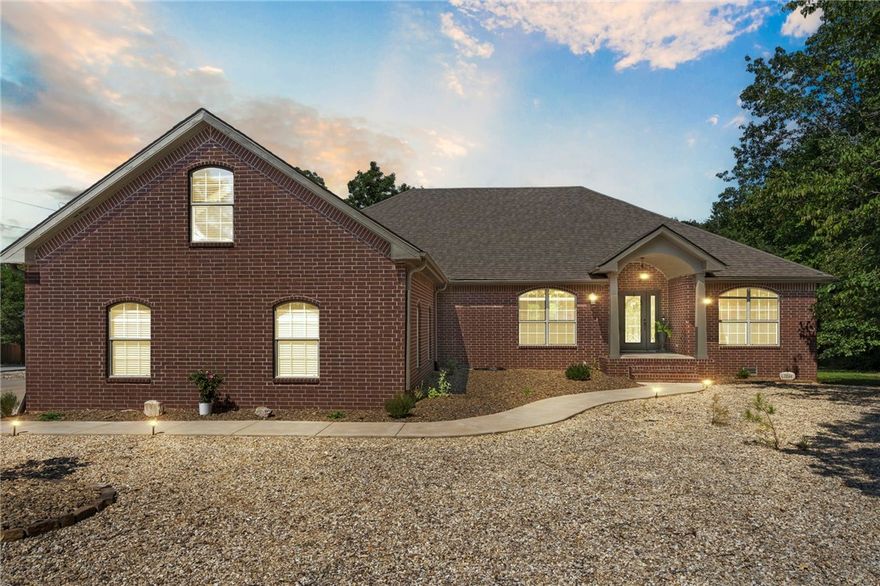 Discover this stunning 2,725 sq ft gem, where meticulous craftsmanship meets thoughtful design. Built by a builder as a personal home, every detail showcases superior quality and attention to detail.
This 3-bedroom, 2.5-bath residence features beautiful wood floors throughout, creating warmth and elegance in every room. The expansive bonus room upstairs is perfect for a home office, media room, or recreational space.

The heart of the home flows seamlessly to your private outdoor oasis, where a huge deck overlooks a serene backyard retreat, ideal for entertaining or peaceful relaxation. The fully landscaped front yard with complete rock work provides low-maintenance beauty.

Practical luxury is further enhanced by a spacious 3-car garage, providing ample storage and convenience. Located in desirable Bella Vista near picturesque Loch Lomond, you'll enjoy the perfect blend of tranquil living and accessibility. This home is a thoughtfully crafted home where quality construction and lifestyle converge.