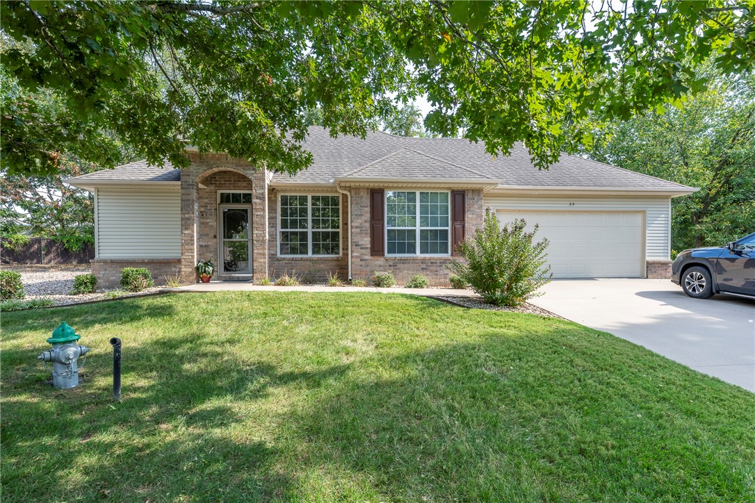 Highland Park Villa - free-standing with community amenities! This 2 bedroom, 2 bath, 1,323 sq ft home also includes a dedicated office and brand new LBP flooring. The light-filled layout offers comfort and flexibility, while the brick and siding exterior and mature trees add timeless curb appeal. Highland Park residents enjoy their own community center with pool, clubhouse, walking trail, organized activities, plus lawn care and exterior maintenance included in the HOA. Conveniently located near Bella Vista Lakes, golf courses and scenic trails with easy access to shopping, dining, the Bentonville Square and Crystal Bridges. Designed for ease of living and welcoming sense of community.