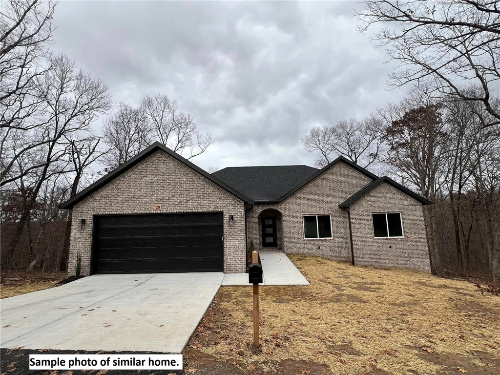 Beautiful new construction by Elite Thomas Homes. Estimated completion date is early September 2025. Get under contract early to choose some finishes and/or upgrades. Photos are of similar homes and finishes may vary. The home is .3 miles to the Back 40 trail access and 1.1 miles to Lake Ann via the Back 40 trail! Main level will have 2 bedrooms and an office, 2 bath, and oversized 2 car garage. Open concept floor plan with spacious kitchen, living room, and dining room. Vaulted ceilings with beams in the main area and a stack stone gas fireplace. Access the large covered and uncovered deck from kitchen. Large primary bedroom with walk-in closet. Primary bathroom has a dual vanity, tile shower, free standing tub and separate toilet room. Bedroom 2 and the office are on the other side of the home with a nice hall bathroom Partial walkout basement will have a larger media/gameroom with bar area,3rd bedroom with walk-in closet and bathroom with fiberglass shower. Also enjoy the 2nd covered deck from the basement.